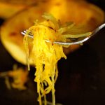 fork holding spaghetti squash strands