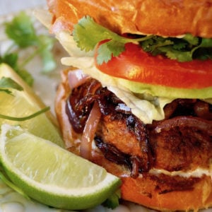 close up of Spicy Sriracha Burger on white plate