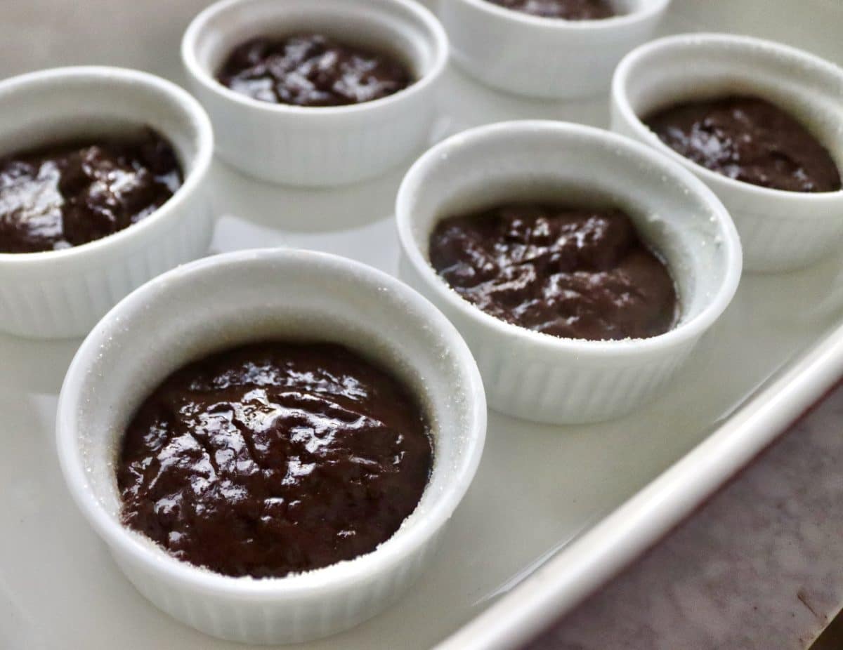 Flourless Chocolate-Cake-with-KahlĂșa-and-Espresso Raw batter for Flourless Chocolate Espresso cakes in individual ramekins.