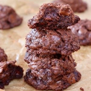 small stack of nutella cookies with one broken in half