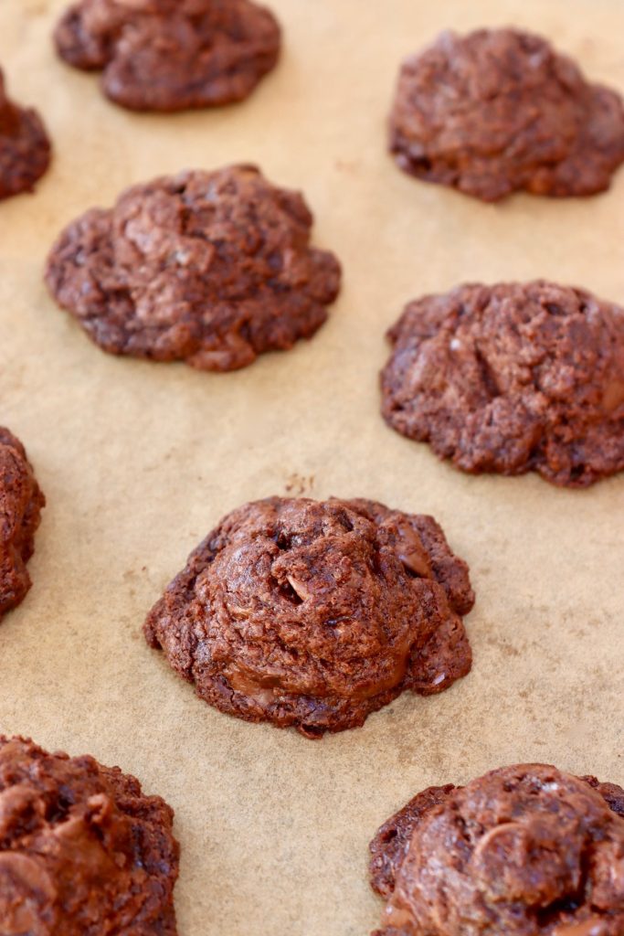 4-Ingredient-Nutella-Cookies-Gluten-Free baked Nutella cookies on parchment paper