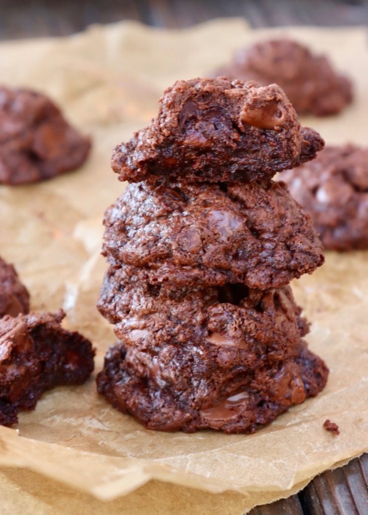 4-Ingredient-Nutella-Cookies-Gluten-Free stack of extra chocolaty gluten-free Nutella cookies, with one broken in half