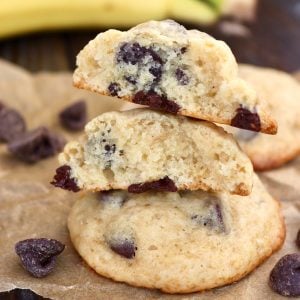 small stack of banana chocoalte chip cookies with one broken in half