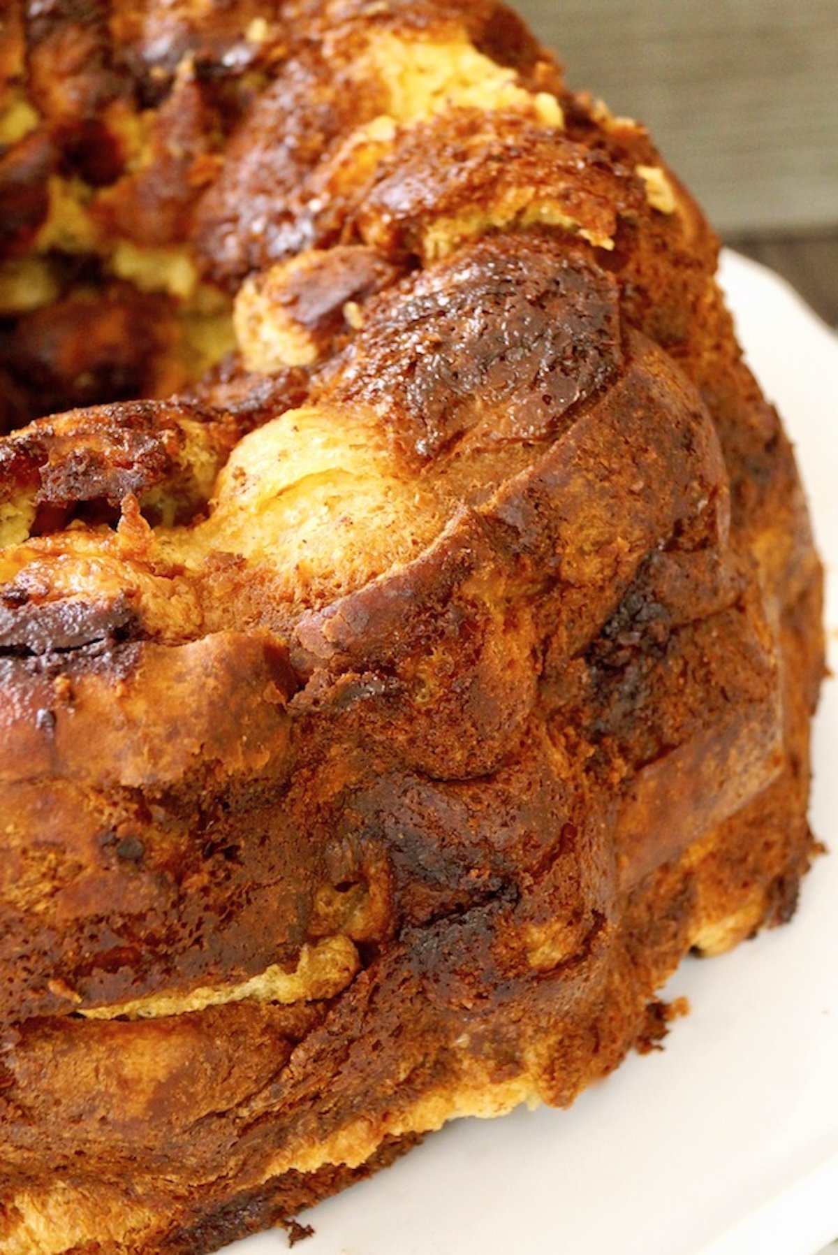 Close up of French Toast Bread Pudding bundt cake - side view.