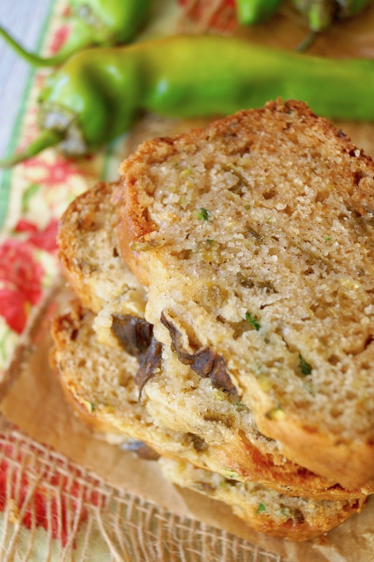 Stack of slices of gluten-free zucchini and hatch chile bread.