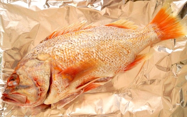 whole raw rockfish on foil