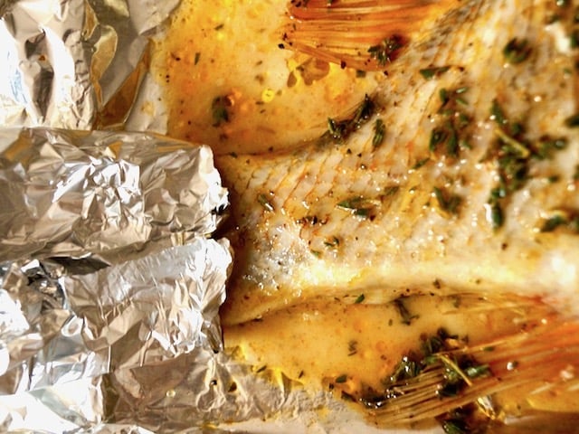 Baked Rockfish with tail wrapped in foil