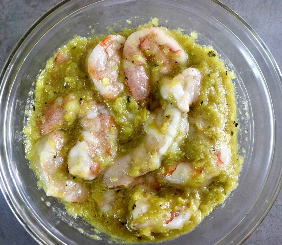 Glass bowl with hatch chile green marinade.