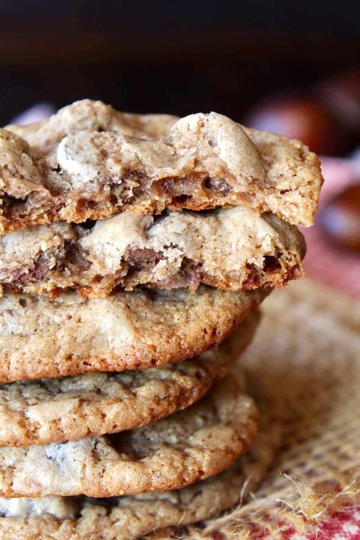 Stack of Chestnut Cookies with one on top broken in half.