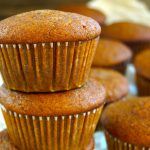 a few pumpkin muffins in a stack