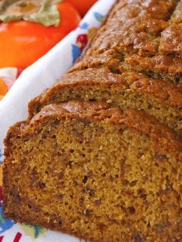 Sliced loaf of persimmon gingerbread.