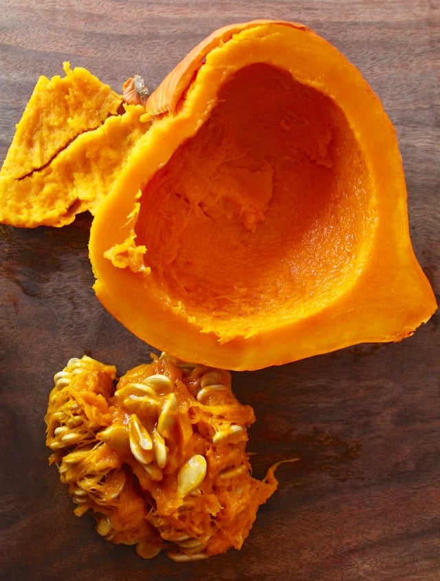 one half of Hokkaido pumpkin with seeds removed