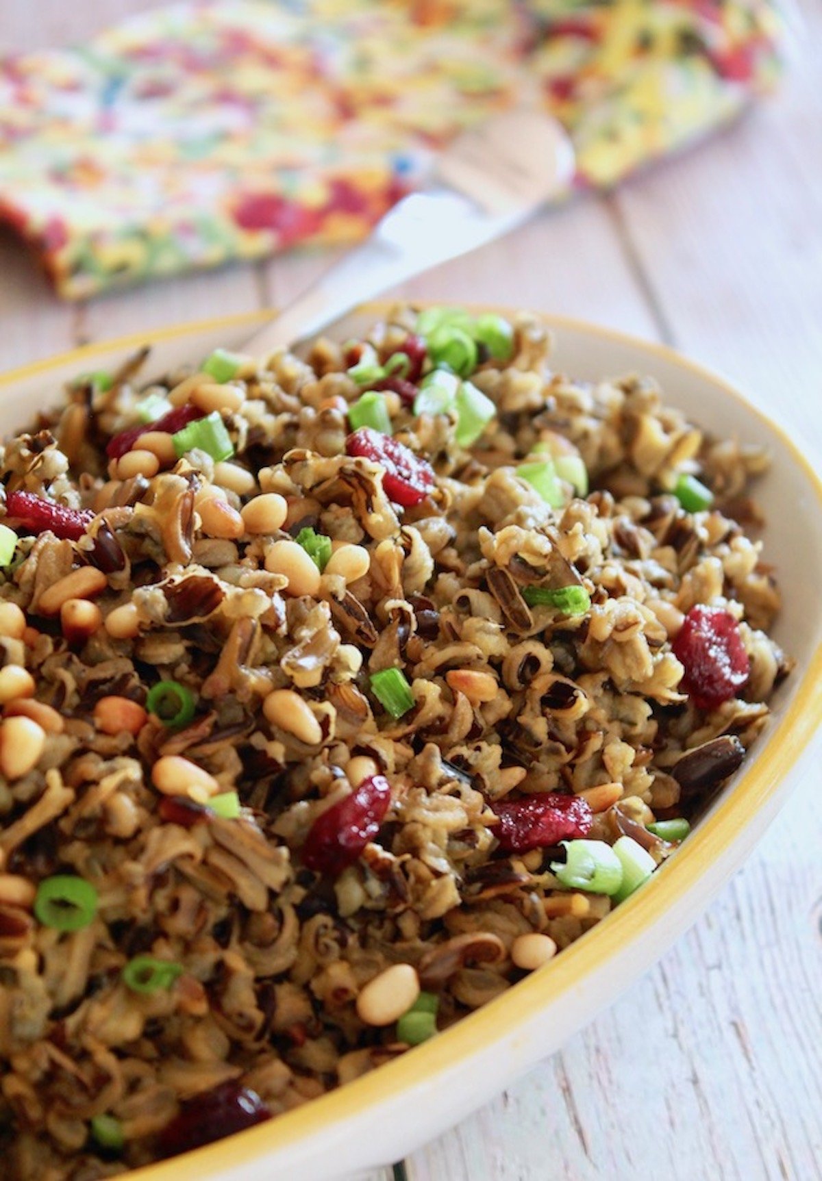 Yellow-Rimmed Dish with Wild Rice and cranberries.