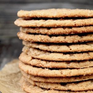 tall stack of thin miso cookies with peanut butter