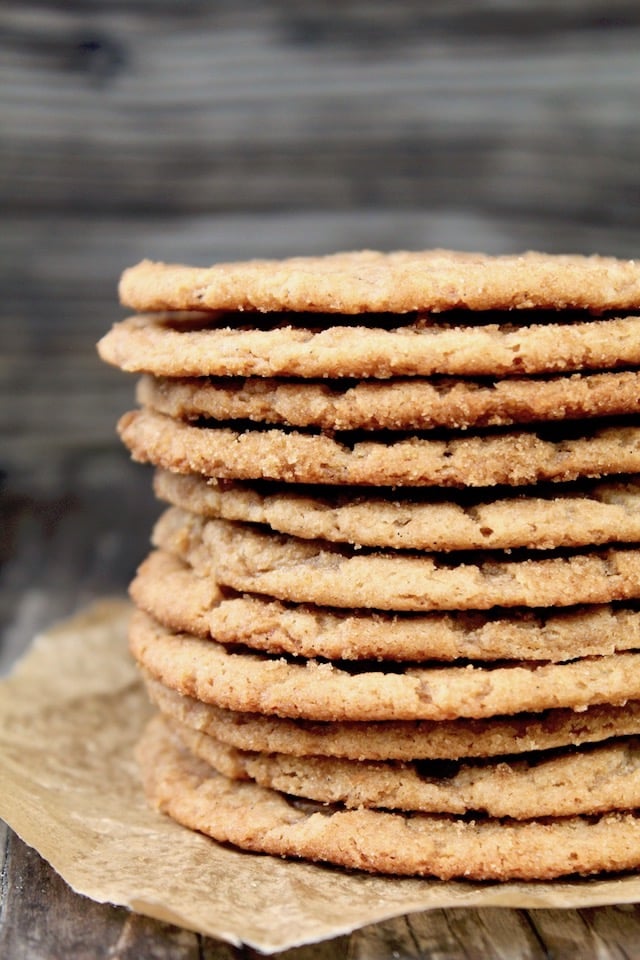 tall stack of thin miso cookies with peanut butter