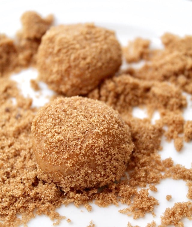 ball of miso cookie dough rolled in brown sugar