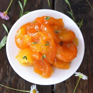 top view of super chunky marmalade on a small white plate.