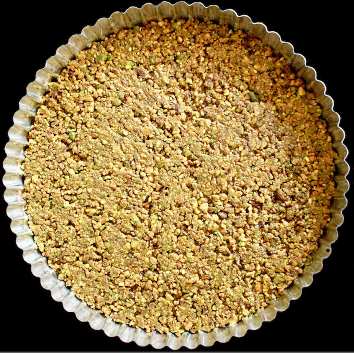 Chocolate-Tart-with-Pistachio-Crust Pistachio Nut crust pressed into tart shell