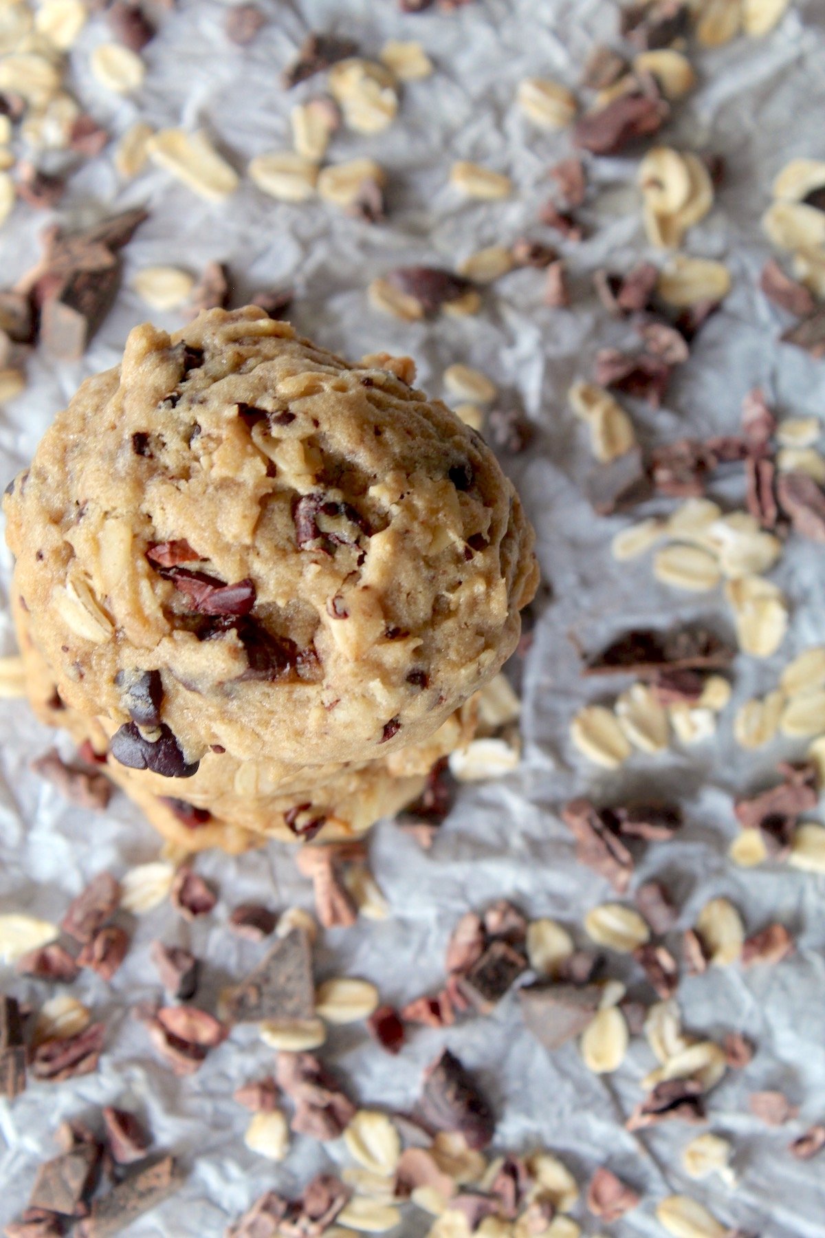 top view of small stack of cookies with cacao nibs and oats