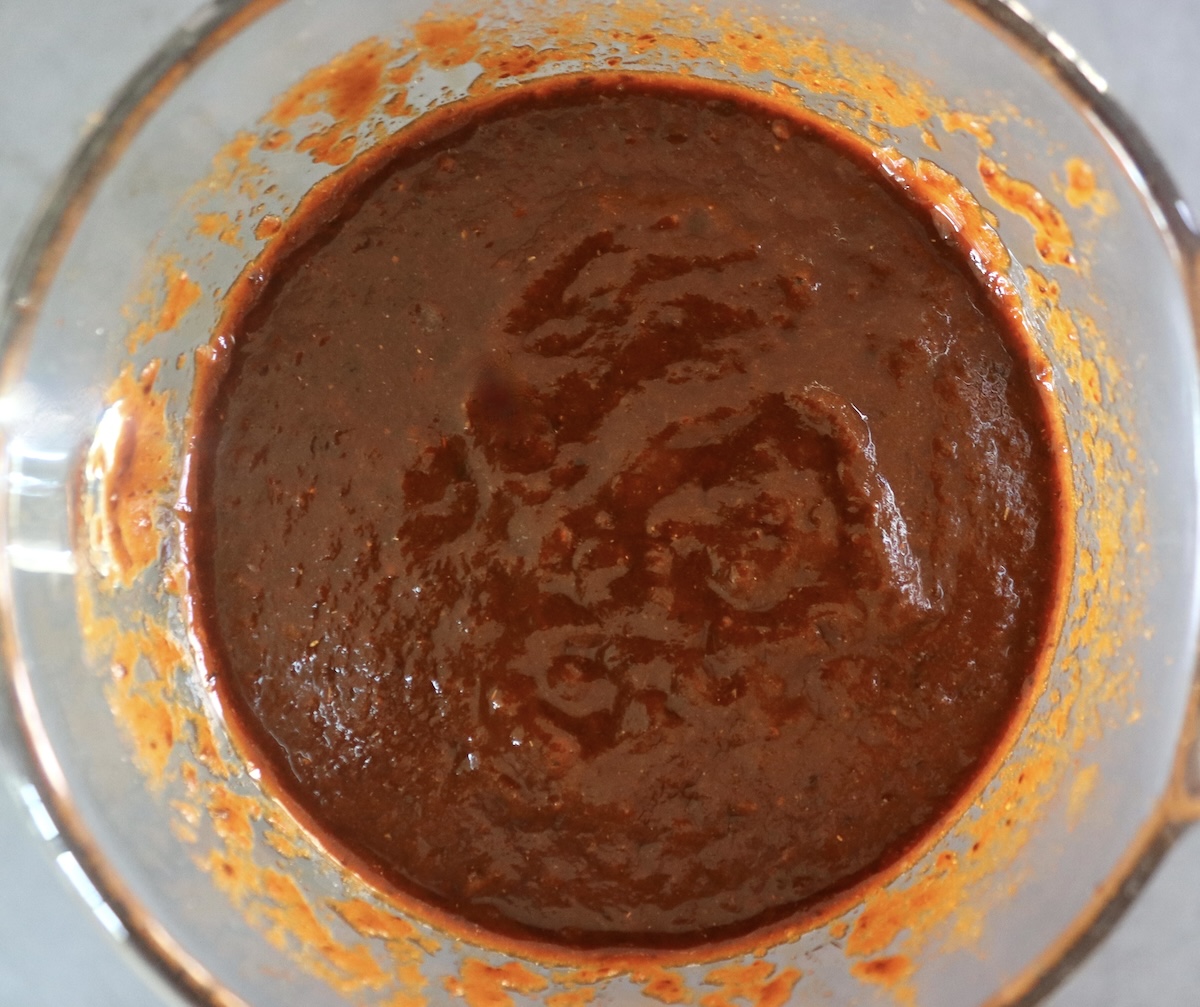 Smooth blended ancho chile sauce in a blender.