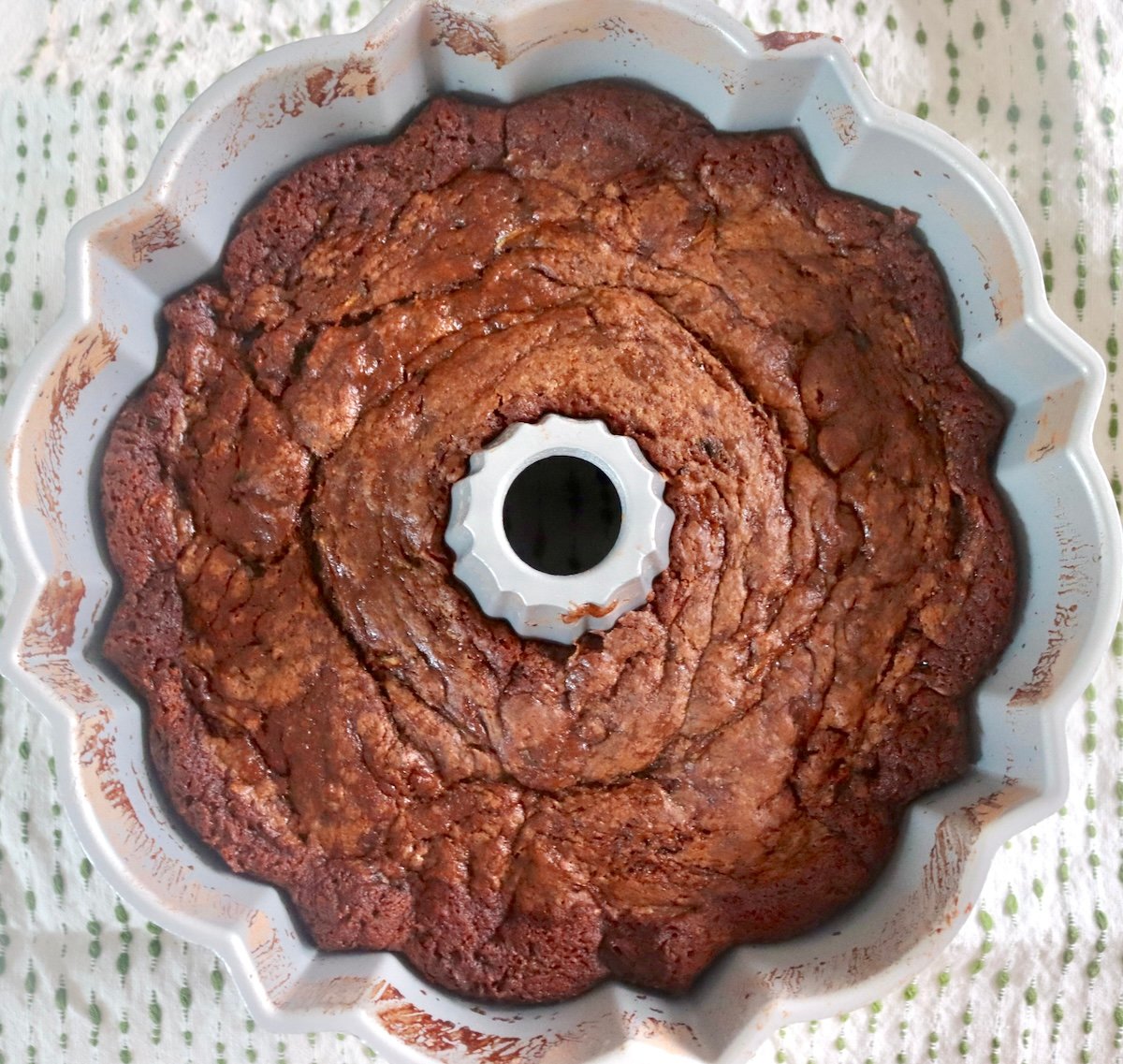 Baked chocolate zucchini cake in bundt pan.