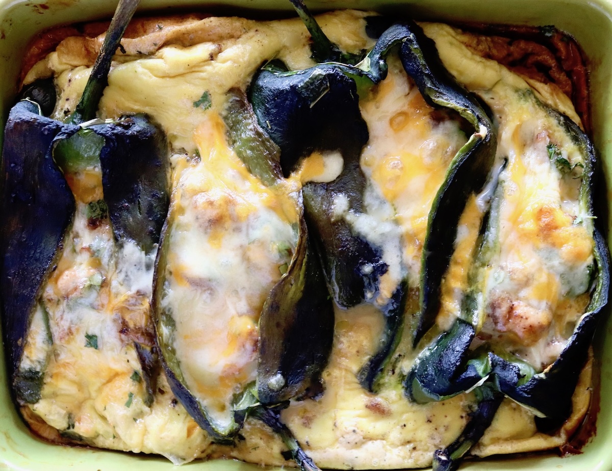 Chile pepper-Egg and sausage casserole topped with melted cheese.