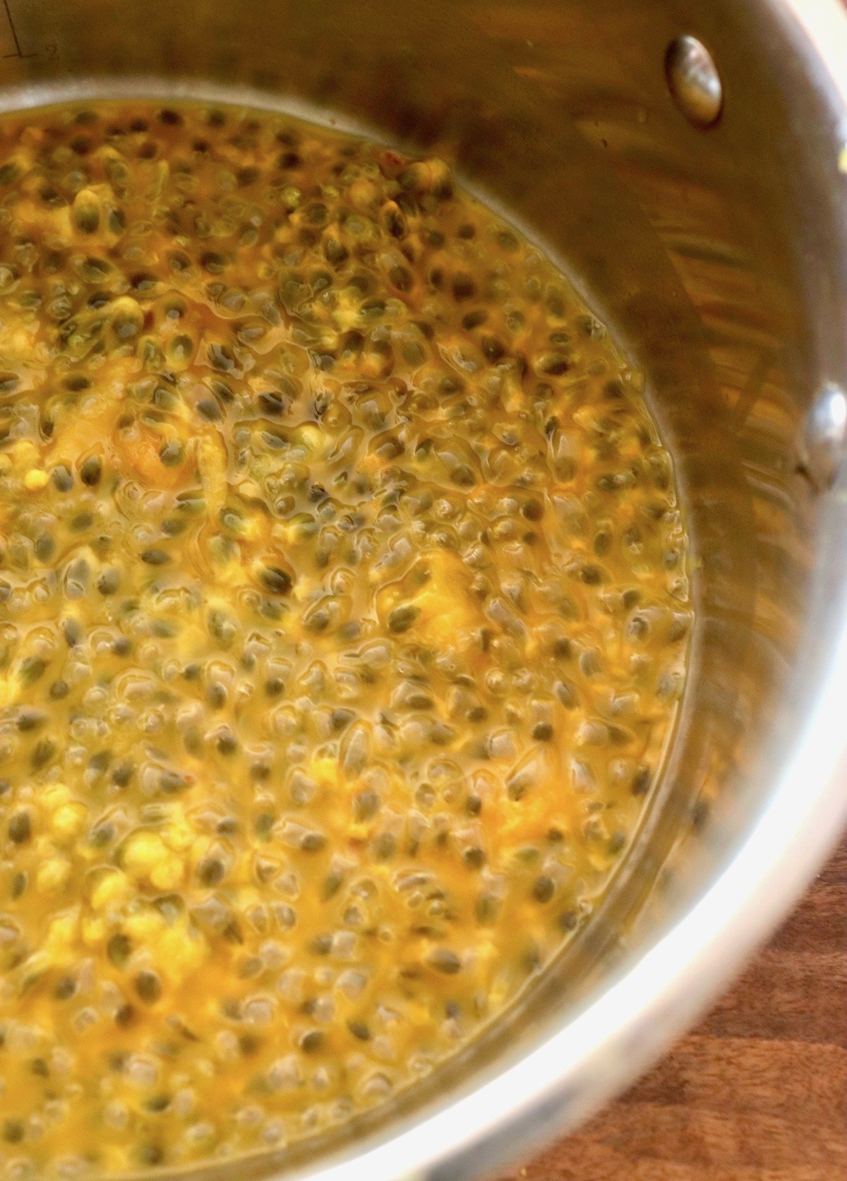 passion fruit pulp in pot.