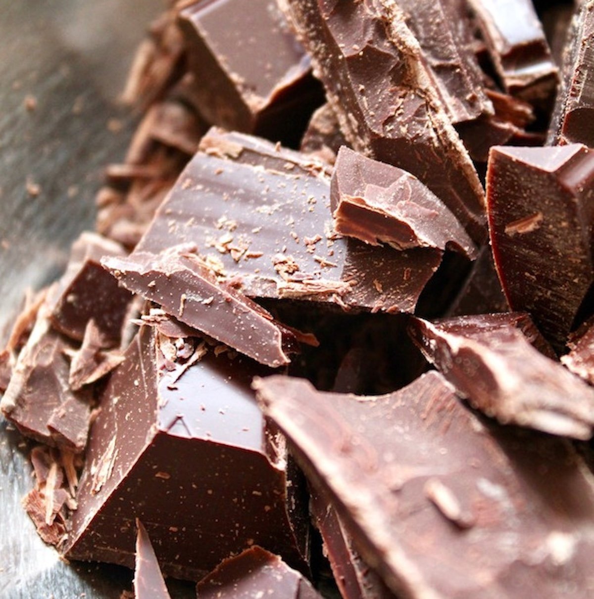 roughly chopped dark chocolate in stainless steel powl