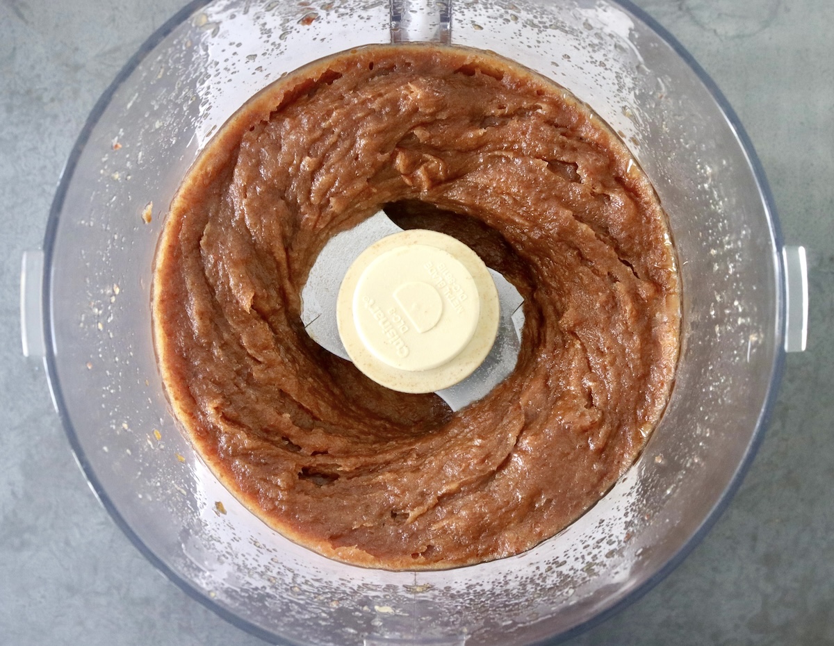 Date paste in a food processor bowl.
