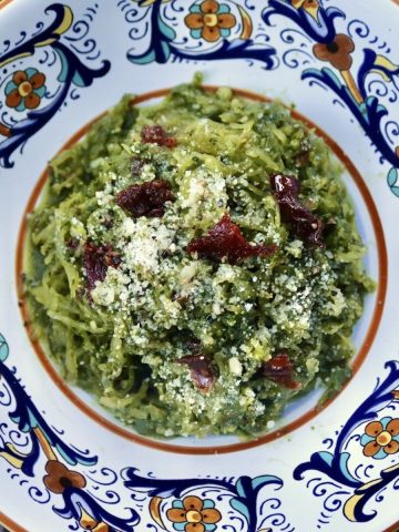 Spinach Pesto Spaghetti Squash in a pretty Italian painted pasta bowl.