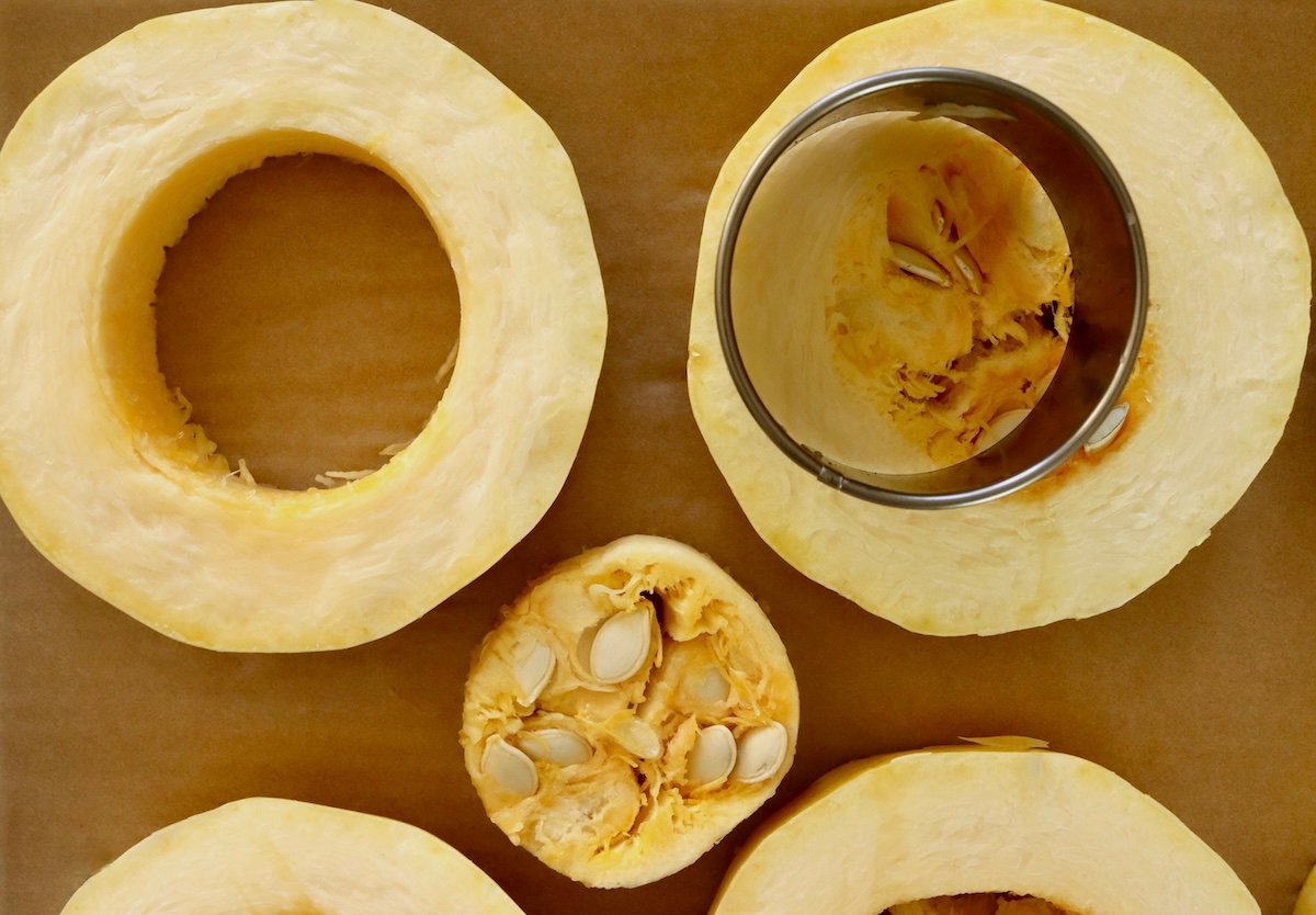 Spaghetti-Squash-Rings-with-Feta-and-Olives Spaghetti squash ring with a round cutter on top.