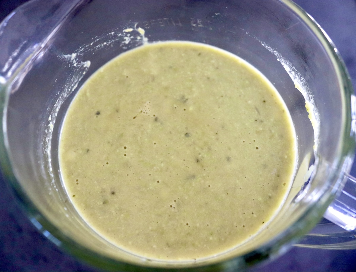 Edamame-Soup-Recipe Top vie of blender with cooked and pureed edamame soup.