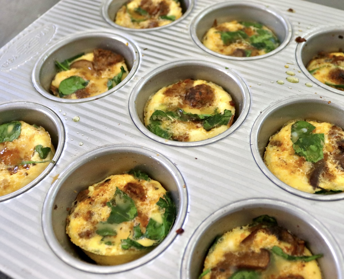 Baked egg bites in a muffin pan.
