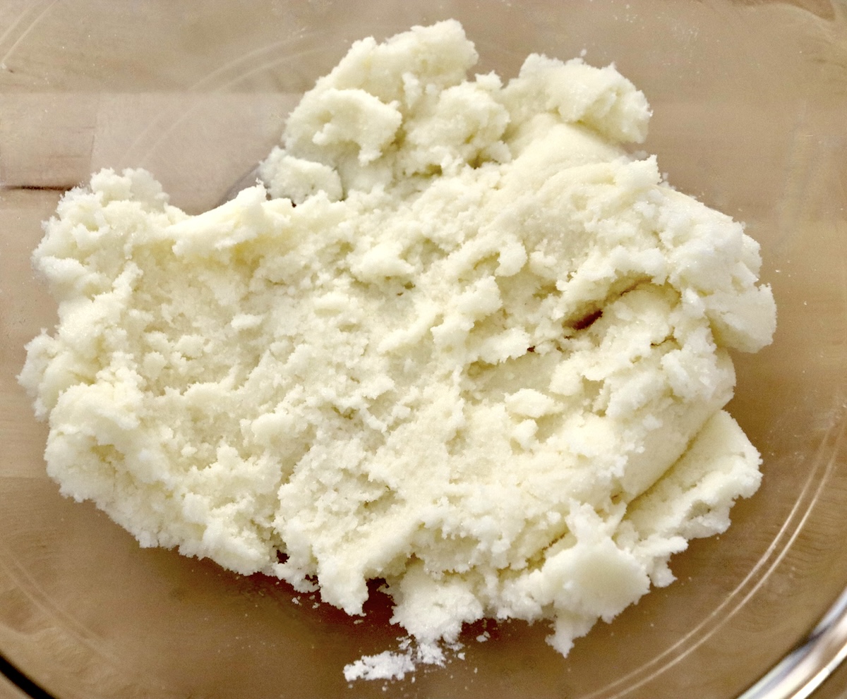 Cornbread-Cookies-Recipe Mixture of butter and sugar in a class bowl.