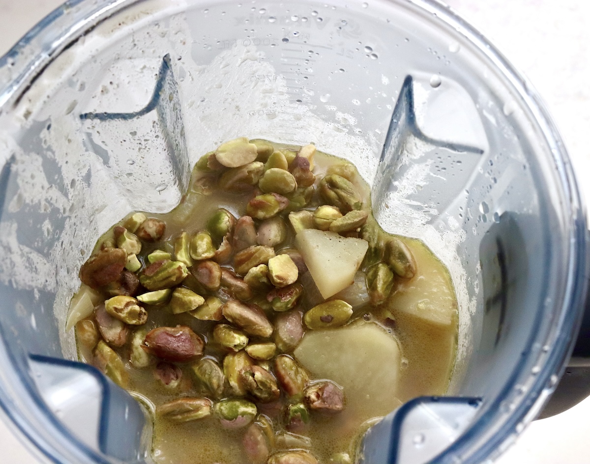 Pistachio-Soup-Recipe pistachios, potato, onion and chicken stock in a blender to make pistachio soup.