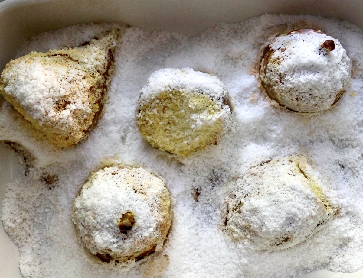 5 salt-crusted beets in a baking pan.